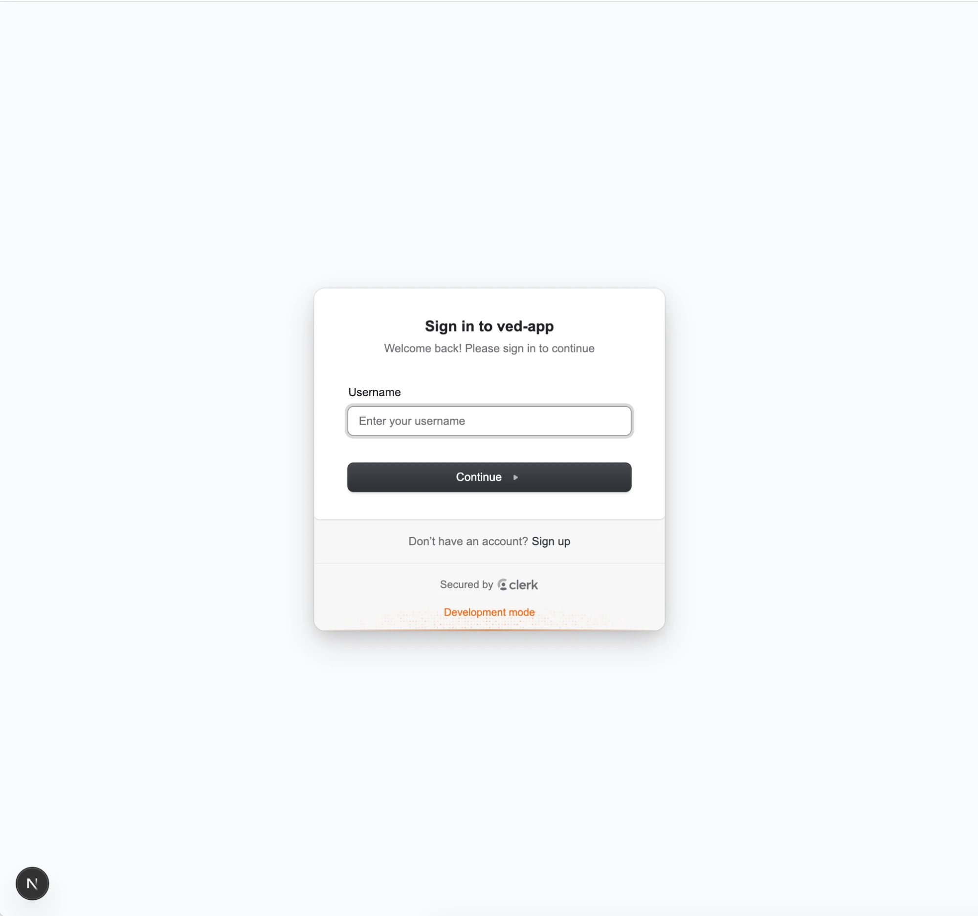 Pantalla de inicio de sesión de VED.app gestionada por Clerk